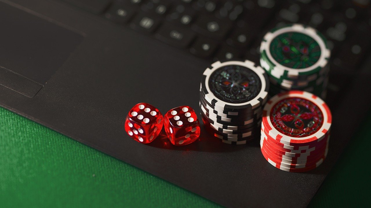 Casino chips on laptop